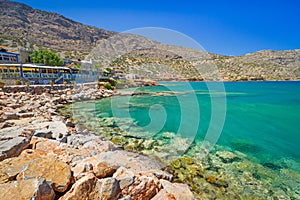 Turquise water of Mirabello bay in Plaka town on Crete