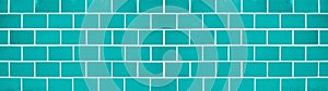 Turquoise abstract colored colorful brick tiles tilework glazed ceramic wall or floor texture wide background banner panorama