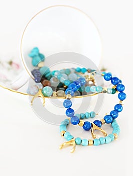 Turquoise agate bracelets with gold wishbone with cup and saucer decor