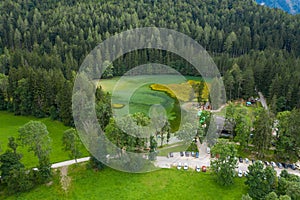 Turquoise Alpine lake, aerial view of Plansar lake in Zgornje Jezersko, Slovenia