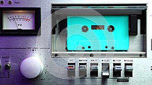 Turquoise Audio Cassette Tape Rolling in Old Grey Deck Player WIth VU Meters