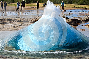 The turquoise blue boiling bubble of Strokkur Geyser before eruption. Gold Circle. Iceland