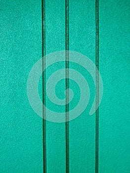 Turquoise blue grooved concrete wall background texture