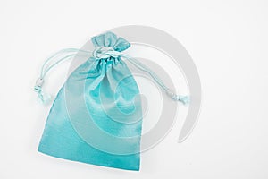 The turquoise blue silk mini gift pouch bag
