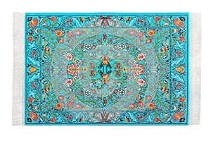 Turquoise carpet horizontally lies on white photo