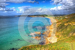 Turquoise clear sea Praa Sands Cornwall England in colourful HDR photo