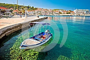 Turquoise coast and boat in Postira