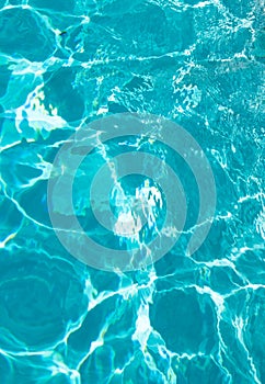 turquoise color background of swimming pool water with ripples in bermudas