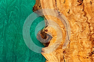 turquoise epoxy resin panel with walnut, texture for design