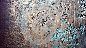 Turquoise and golden messy wall stucco texture background. Decorative paint for the walls