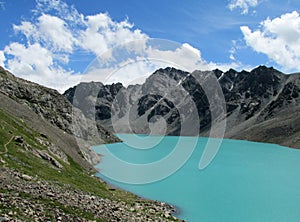 Turquoise lake in the mountains Ala-Kul