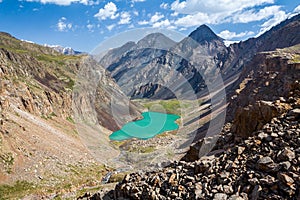 Turquoise lake in mountains of Tien Shan