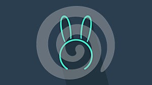 Turquoise Mask with long bunny ears icon isolated on blue background. Fetish accessory. Sex toy for adult. 4K Video
