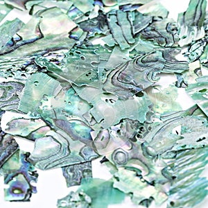 Turquoise natural gemstone nacre seashells close-up, beautiful texture of gemstone photo