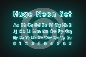 Turquoise neon capital alphabet letters and numbers, glow font set photo
