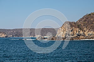 Turquoise ocean a sunny day in huatulco mexico