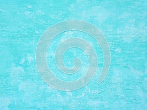 Turquoise painted wall background, texture. Concrete structure closeup