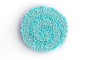 Turquoise Plastic granules. The dye to the polypropylene, the po