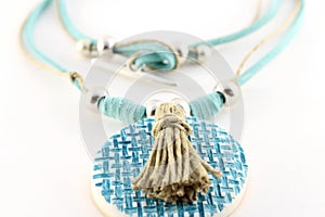 Turquoise polymeric clay necklace with pompon