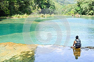 Turquoise pools and limestone bridges surrounded by the jungle i