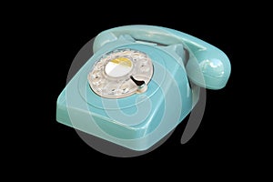 Turquoise rotary dial seventies telephone