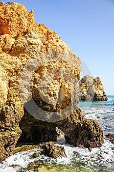 Rocks take a bath into the sea at Ponta da Piedade photo