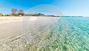 Turquoise sea in Piscina Rei beach photo