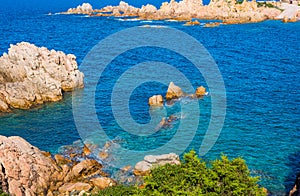 Turquoise sea and rocks in Costa Paradiso shoreline