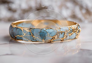 Turquoise stone embedded in a gold bracelet placed on a sleek marble surface, AI-generated.
