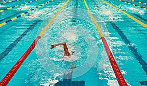 Turquoise swimming pool lanes, a symbol of sport