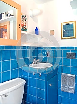 Turquoise tile work in a bathroom