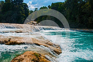 Turquoise water of Agua Azul falls, Chiapas, Palenque, Mexico. Beautiful landscape with waterfall.