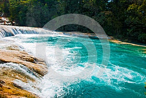 Turquoise water of Agua Azul falls, Chiapas, Palenque, Mexico. Beautiful landscape with waterfall.