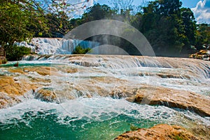 Turquoise water of Agua Azul falls, Chiapas, Palenque, Mexico. Beautiful landscape with waterfall.