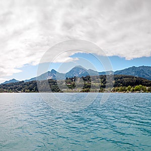 Turquoise water of Faaker See with Alps, Austria