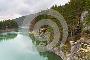 Turquoise water in the Finna River near the village of Vagamo in Norway