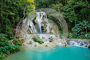 Turquoise water of Kuang Si waterfall, Luang Prabang, Laos. Tropical rainforest. The beauty of nature