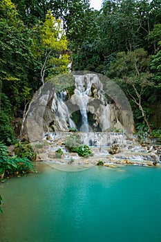 Turquoise water of Kuang Si waterfall, Luang Prabang, Laos. Tropical rainforest. The beauty of nature