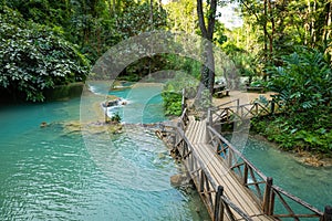 Turquoise water of Kuang Si waterfall, Luang Prabang, Laos. Tropical rainforest. The beauty of nature