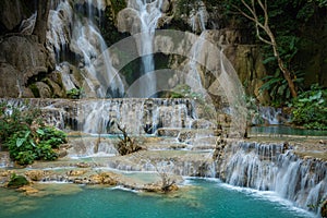 Turquoise water of Kuang Si waterfall, Luang Prabang, Laos. Tropical rainforest. The beauty of nature