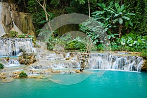 Turquoise water of Kuang Si waterfall, Luang Prabang, Laos. Tropical rainforest. The beauty of nature