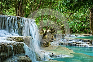 Turquoise water of Kuang Si waterfall, Luang Prabang, Laos. Tropical rainforest. The beauty of nature