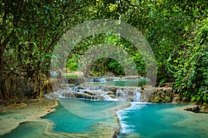 Turquoise water of Kuang Si waterfall, Luang Prabang, Laos. Tropical rainforest. The beauty of nature