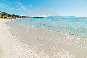 Turquoise water in Le Bombarde beach in Alghero