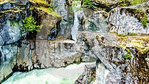 Turquoise water of the Lillooet River cascading down Nairn Falls