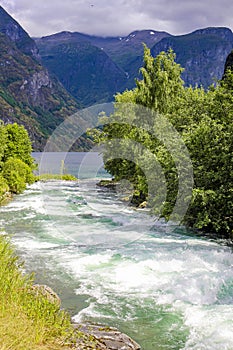 Turquoise water in the river in Undredal Aurlandsfjord Sognefjord Norway