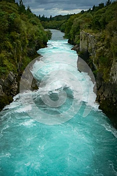 Turquoise water of the Waikato River at Huka Falls waterfall, North Island, New Zealand