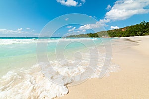 Turquoise water and white sand in world famous Anse Lazio beach in Praslin island