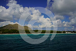 Turquoise waters of Alcudia Beach, Playa de Muro near Port d`Alcudia, Mallorca, Spain. photo