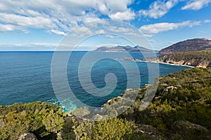 Turquoise waters of Carp bay, view from Cape Tourville Lighthouse, Freycinet National Park, Tasmania, Australia .